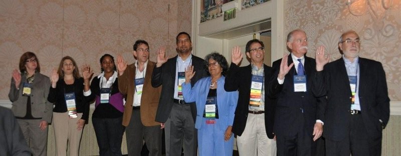 FMDA- Oct. 2011 127.jpg - New FMDA officers and board members being sworn into office by AMDA President Dr. Karyn Leible (not shown).